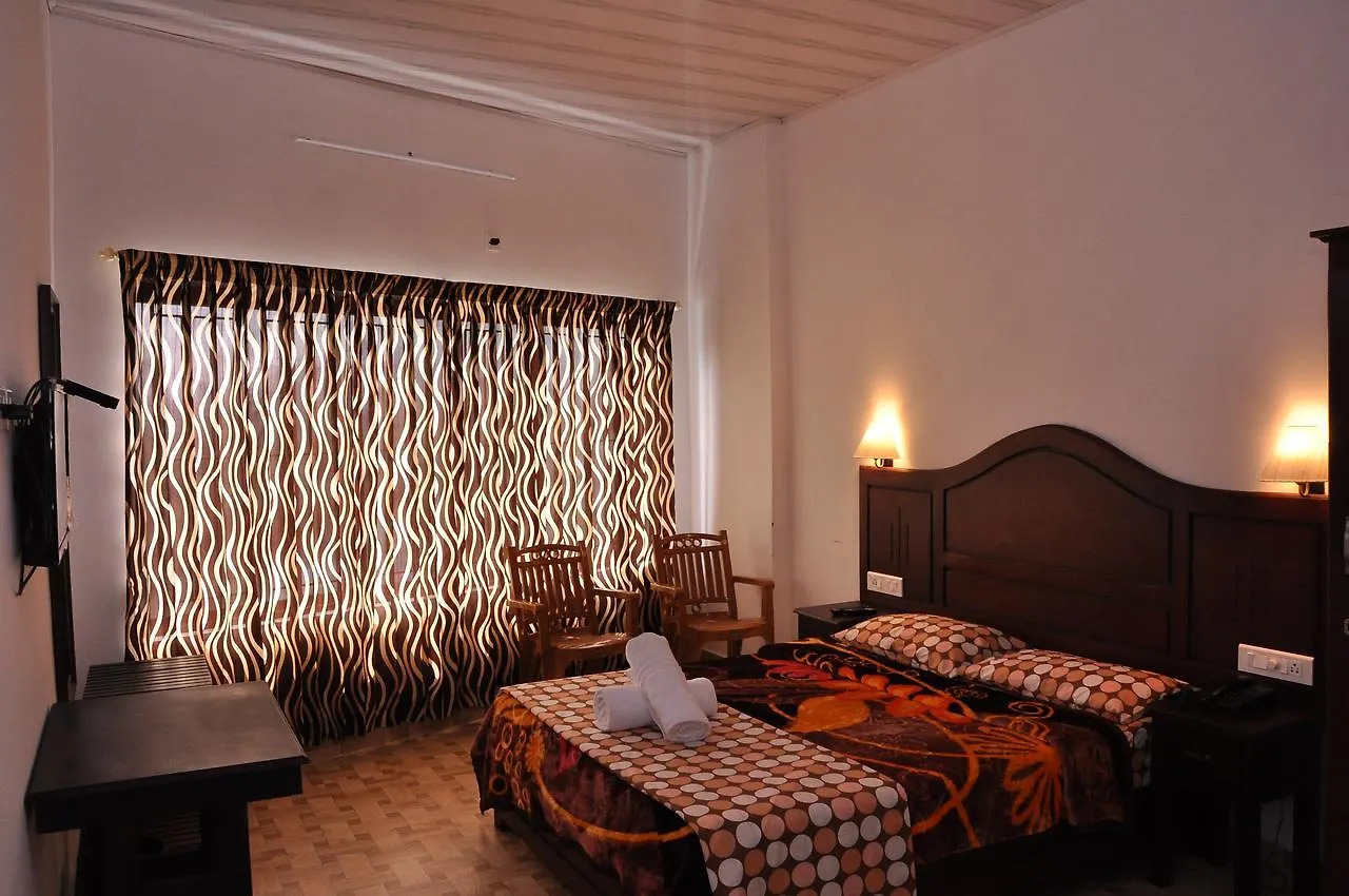 Natura Inn Munnar Hotell